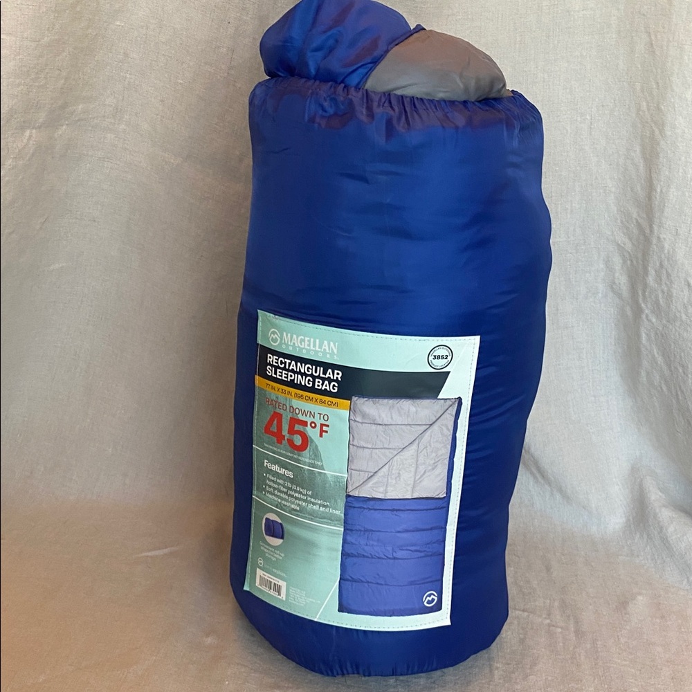 Magellan Outdoors blue Rectangular Sleeping Bag in Storage Sack